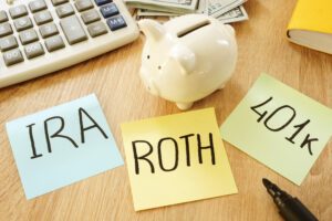 Memo sticks with words ira 401k roth retirement plans